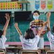 young asian female teacher wearing medical face students rural thai village school are learning 1