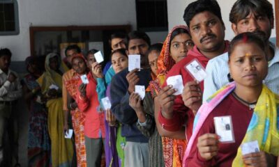 A large number of voters in a queue to cast their vote at a polling booth during the Madhya Pradesh Assembly Election in Bhopal on November 25 2013