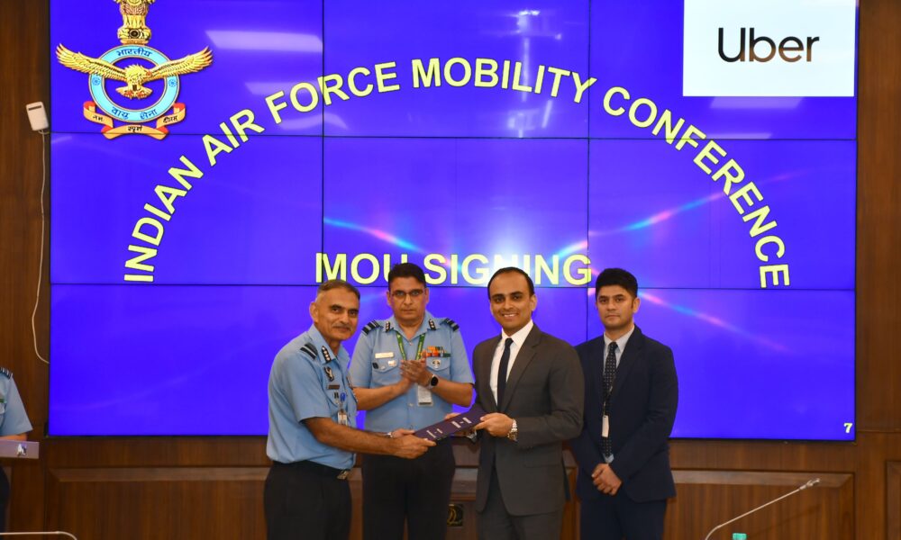 Air Officer In Charge Administration Air Marshal RK Anand VSM and Abhinav Mittoo Sr. Country General Manager Uber for Business Uber India South Asia